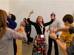 Participants engaging in movement and pantomime strategies led by Jen Oleniczak.