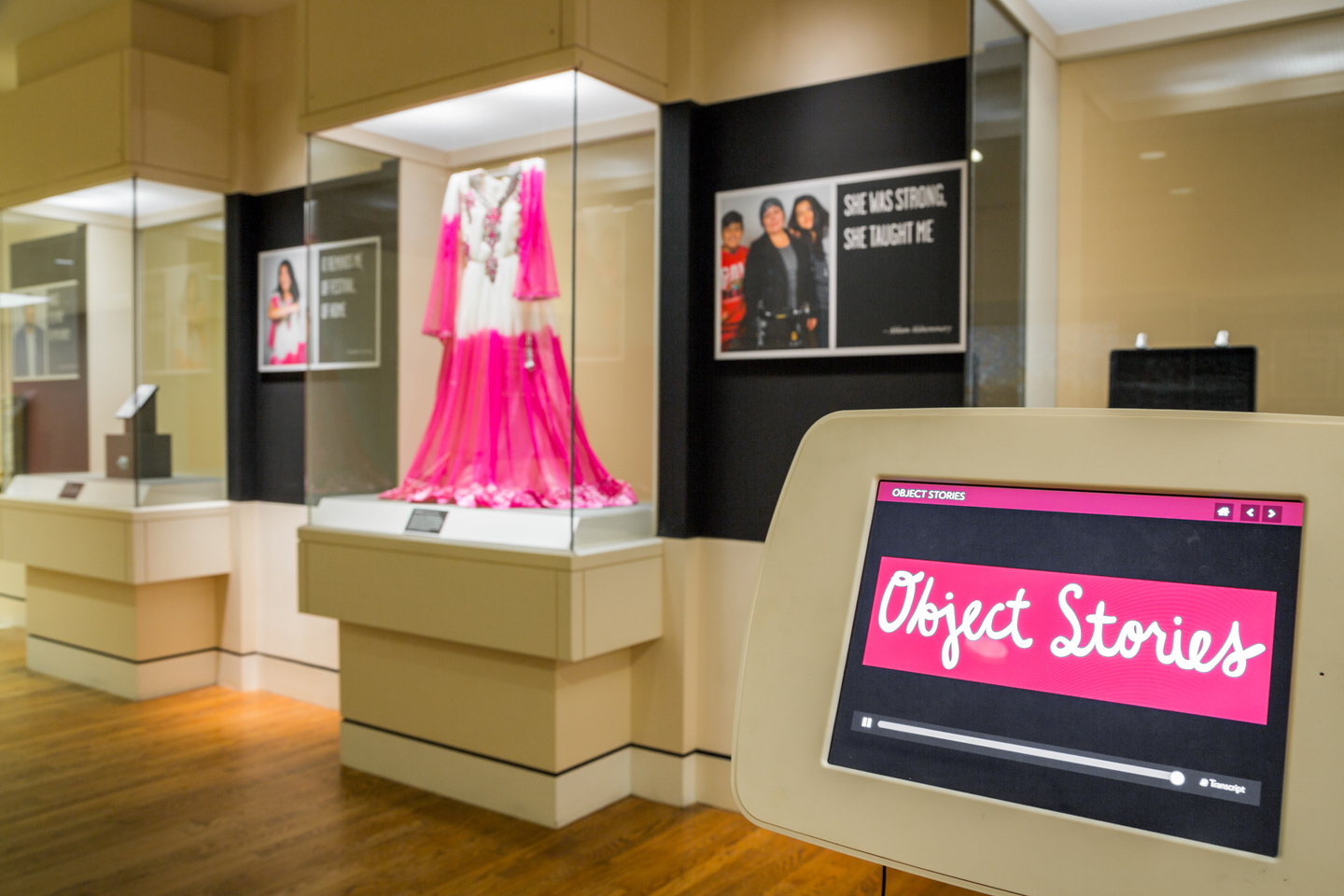 Photo of Object Stories gallery during exhibition "Person, Place, Thing: Objects and the Making of a New Life."