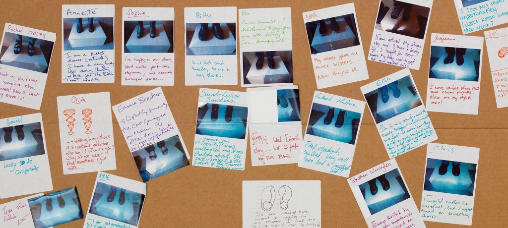 Photo of stories written by visitors participating in the "A Mile in My Shoes" exhibit