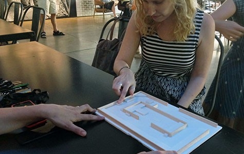 Reviewing an exhibition floor plan with our community partners.